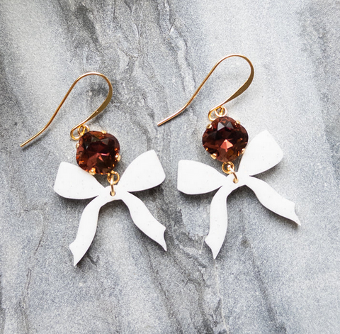 O’Lolly White Bow Earrings w/Maroon Stone